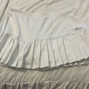 Cute white pleated tennis skirt.